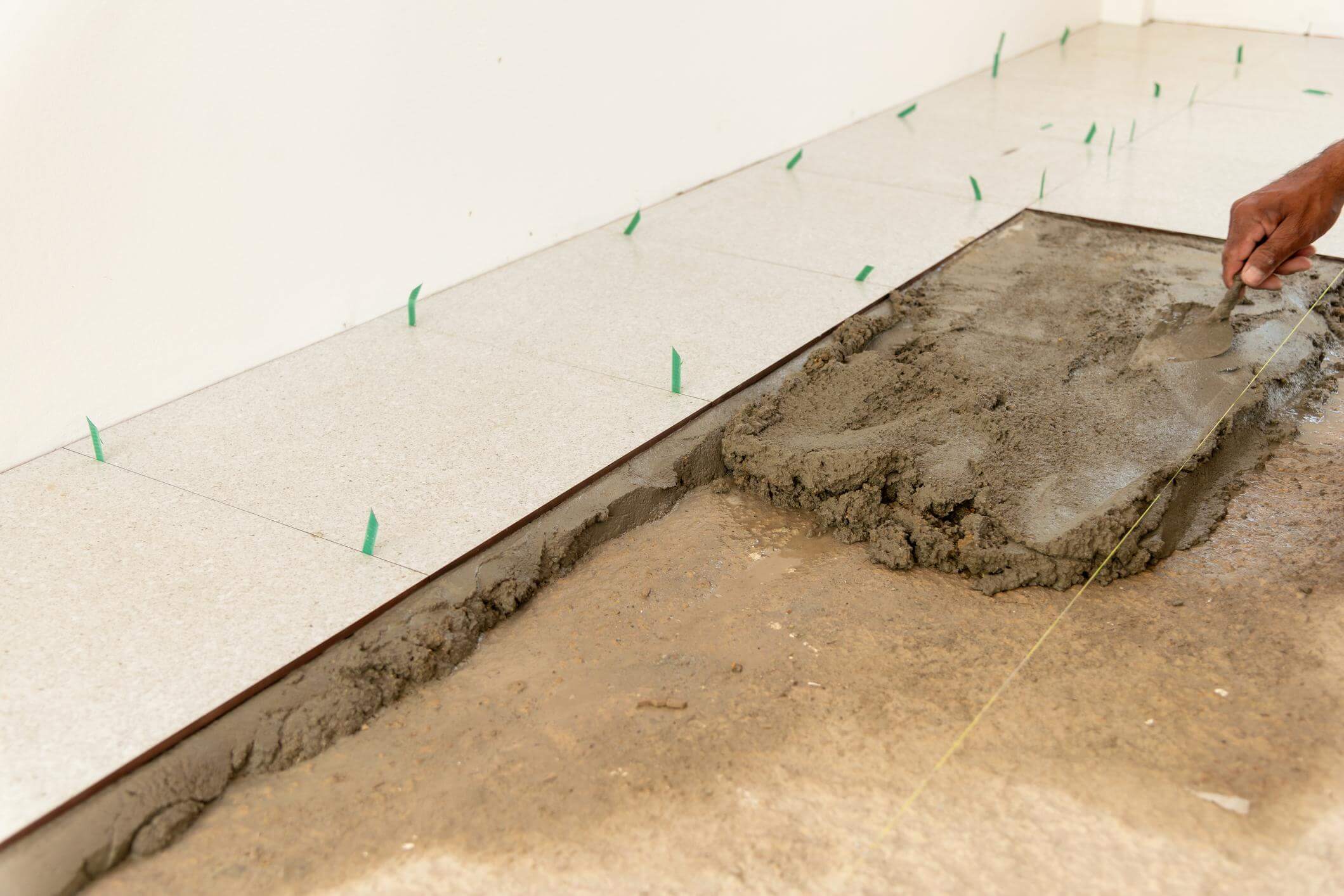 Tile installation process during bathroom remodel in Worcester MA